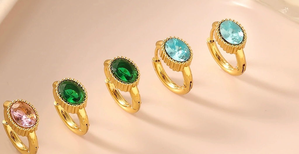 Zircon-studded earrings with 18K gold-plated ear backs, exquisite stainless steel light luxury jewelry with a high-end feel, titanium steel accessories.