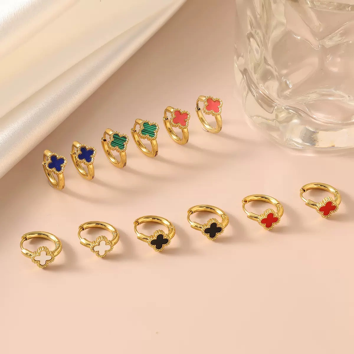 Zircon-studded earrings with 18K gold-plated ear backs, exquisite stainless steel light luxury jewelry with a high-end feel, titanium steel accessories.